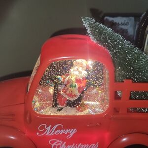 Festive Red Christmas Truck with Santa and Tree